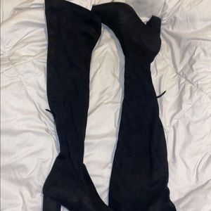 Black high thigh boots